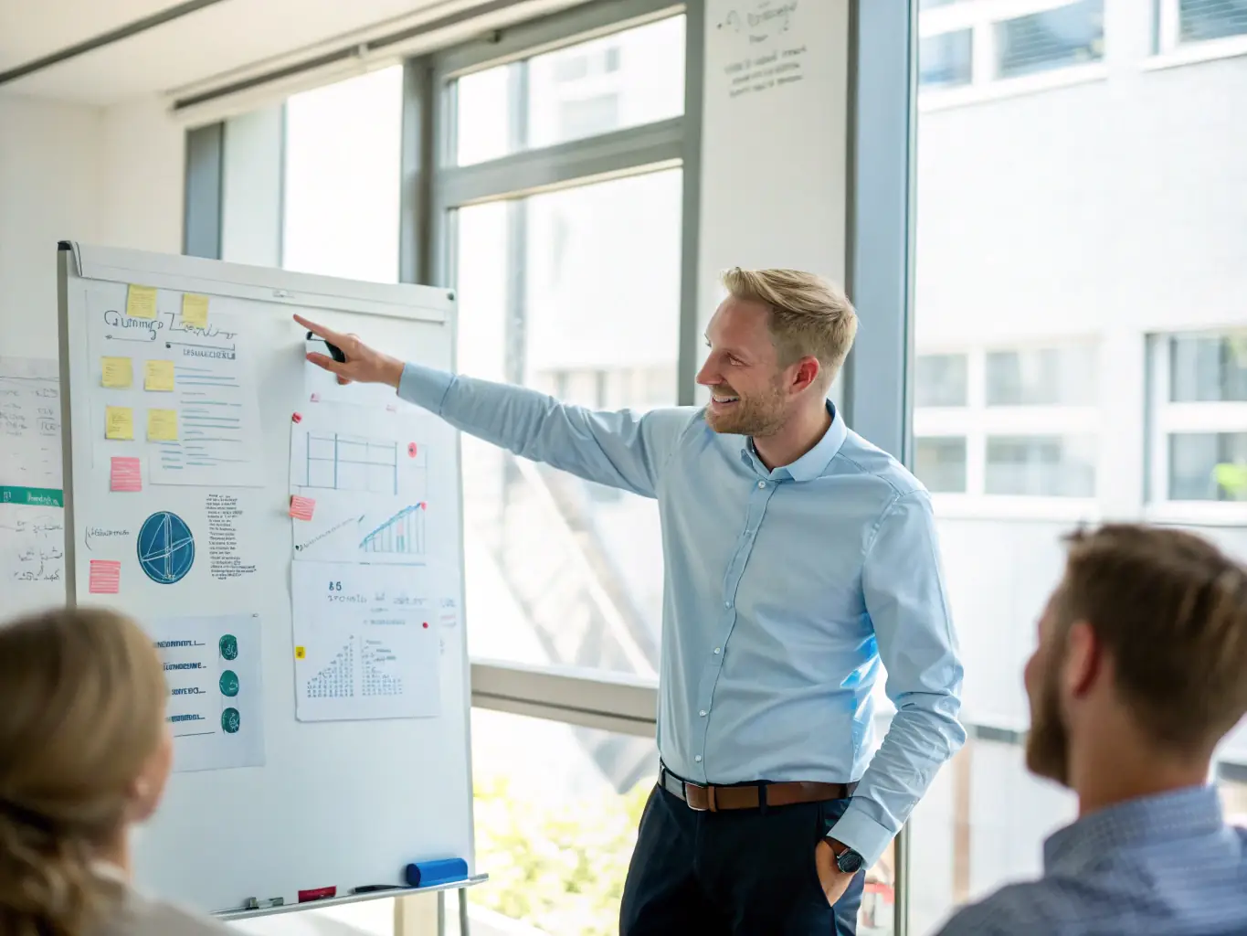 A data scientist presenting predictive analytics insights on a dashboard, showcasing trends and potential risks, in a conference room setting.
